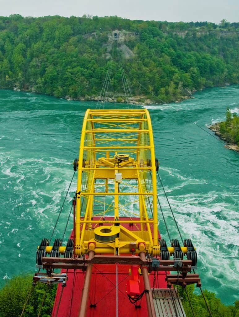 An aero car prepares to cross the churning waters of the Niagara whirlpool.