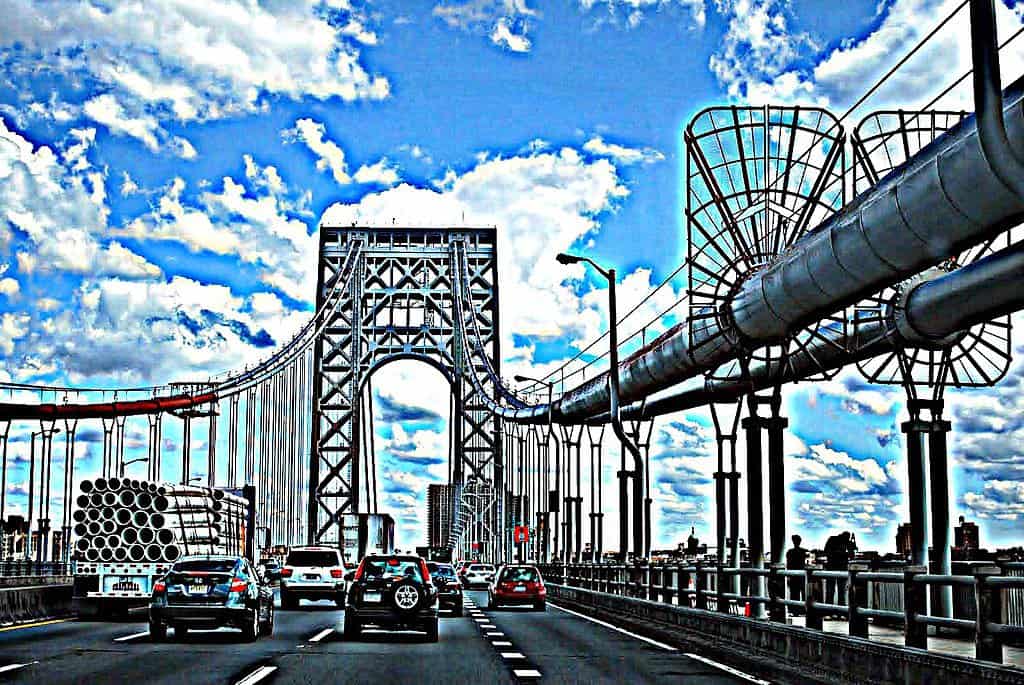 Cars drive along the George Washington Bridge. The George Washington Bridge is  one of the 89 highest bridges in the US.