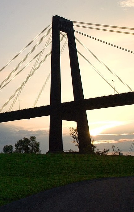 The Hale Boggs Memorial Bridge stands silhouetted in the early morning light. The Hale Boggs Memorial Bridge is one of the highest bridges in the US.