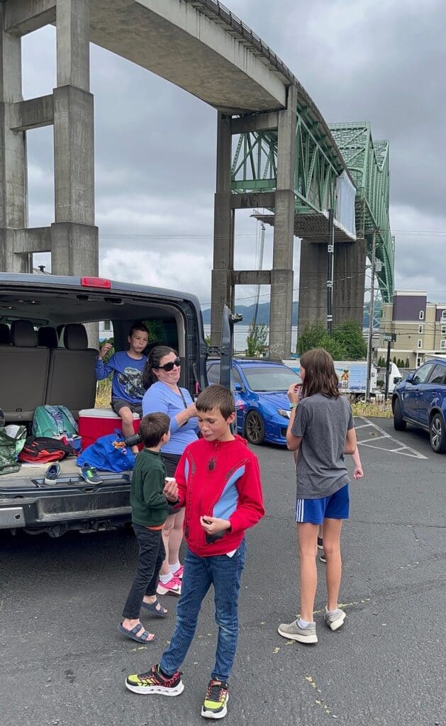 The Astoria-Megler Bridge looms over our family as we stop for a snack in the historic Uniontown area. Astoria-Megler Bridge is one of the highest bridges in the US.