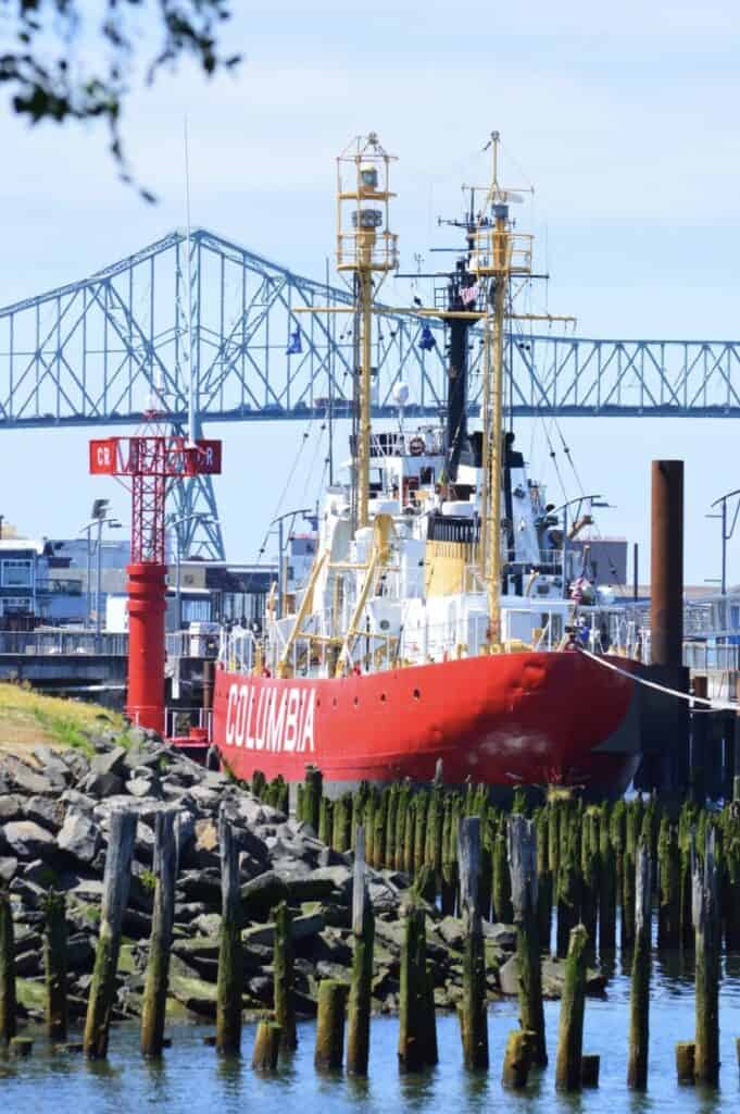 Lightship Columbia with the Astoria-Megler bridge in the background.