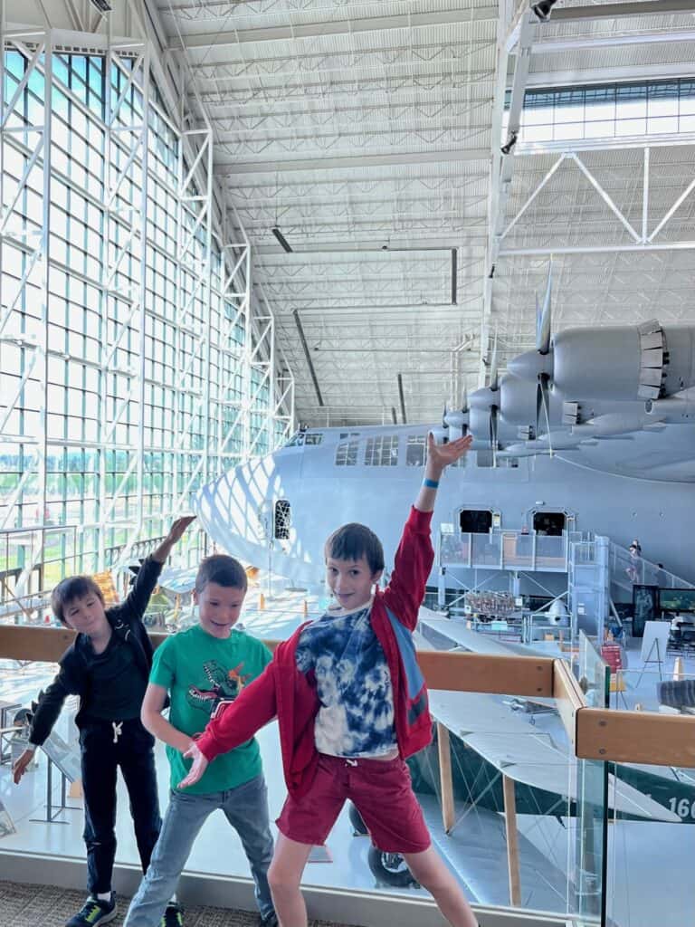 Our boys on the upper level with the Spruce Goose in the background.