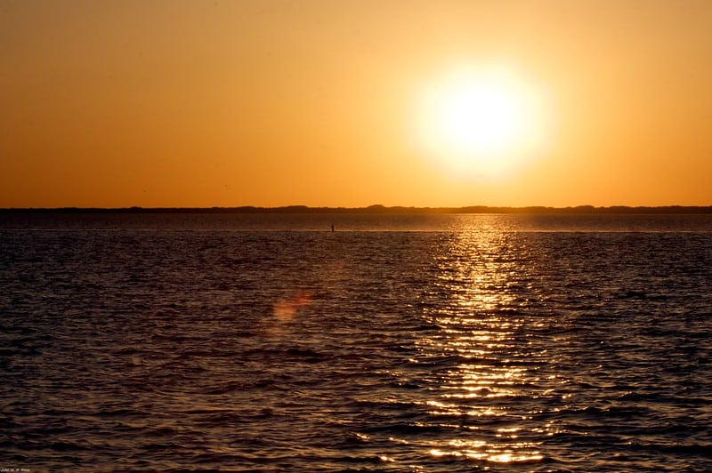 The sun shines over the waters of Laguna Madre at Padre Island National Seashore. 