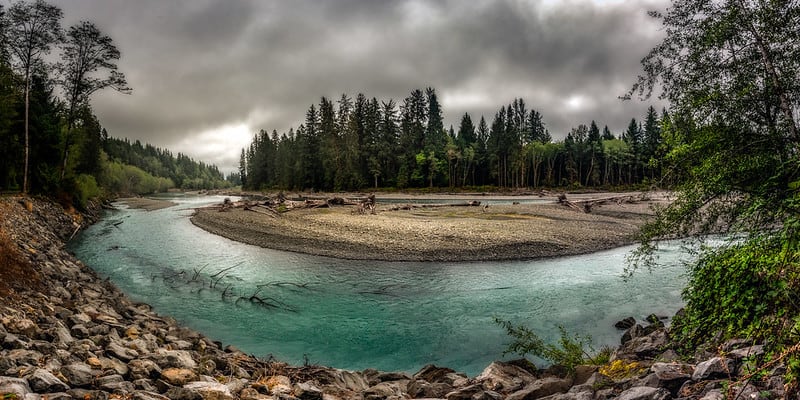 The Hoh River meanders through Olympic National Park. Olympic National Park is one of the best national parks to visit in November and December.