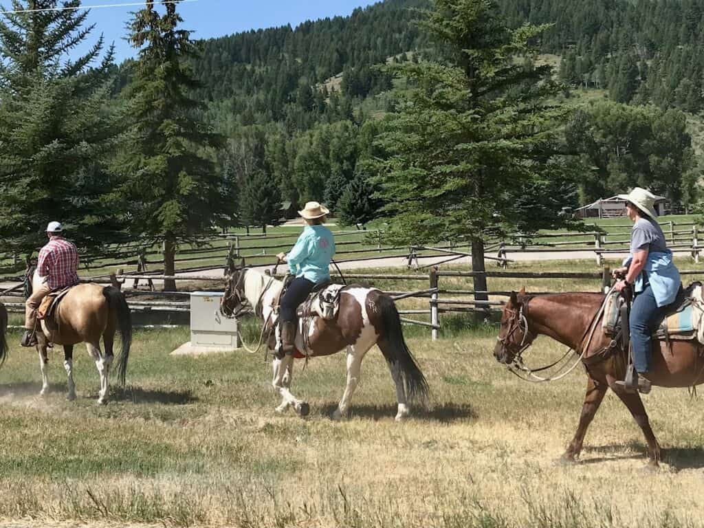 Riders on horseback in Wyoming.