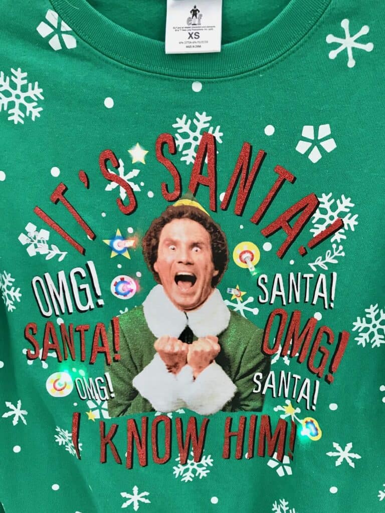 Green Light up sweater with Buddy the Elf yelling "It's Santa! I Know Him!".Fun things to do at Christmas time.