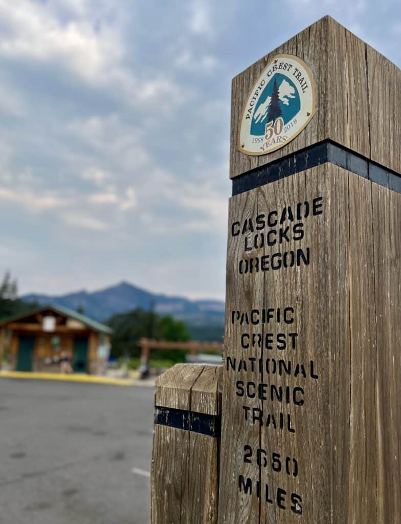 The trail marker for the Pacific Crest Trail stands proudly at Cascade Locks, Oregon.