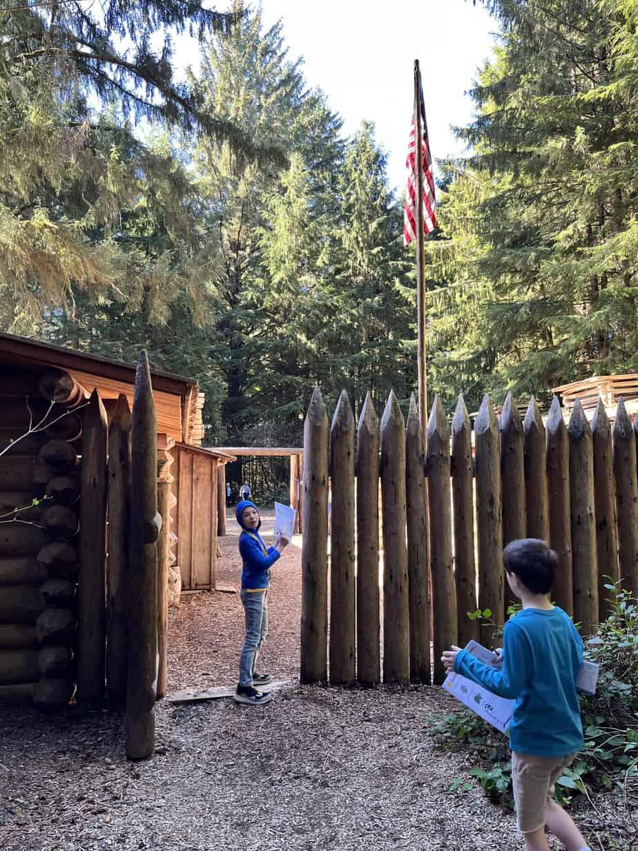 Our boys walking into the palisades of the reconstructed Fort Clatsop at Fort Clatsop NHP