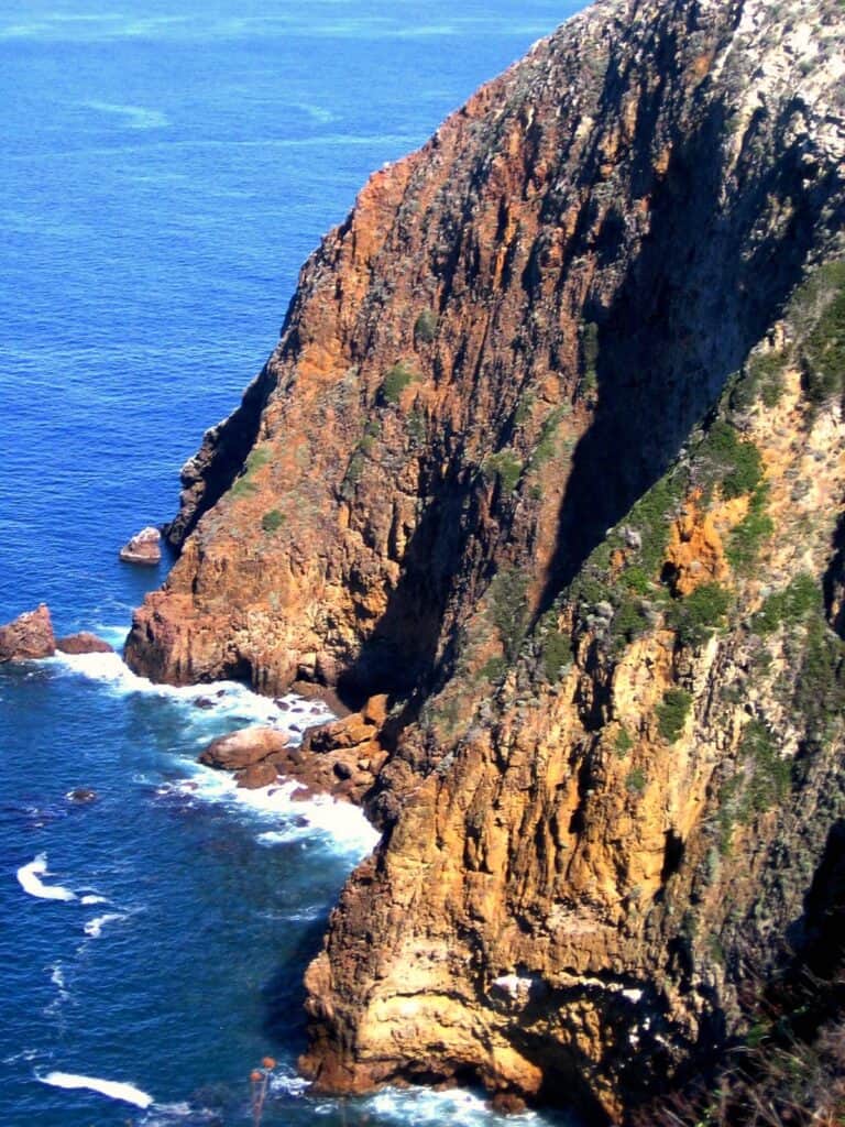 High cliffs tower over ocean waves at Channel Islands National Park.