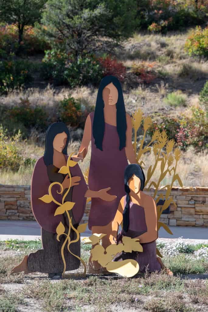Statues celebrate the indigenous past at Chimney Rock National Monument.