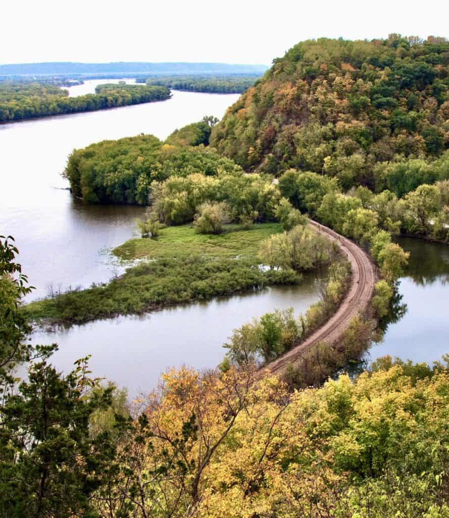 Autumn leaves fringe the Mississippi River at Effigy Mounds National Monument.