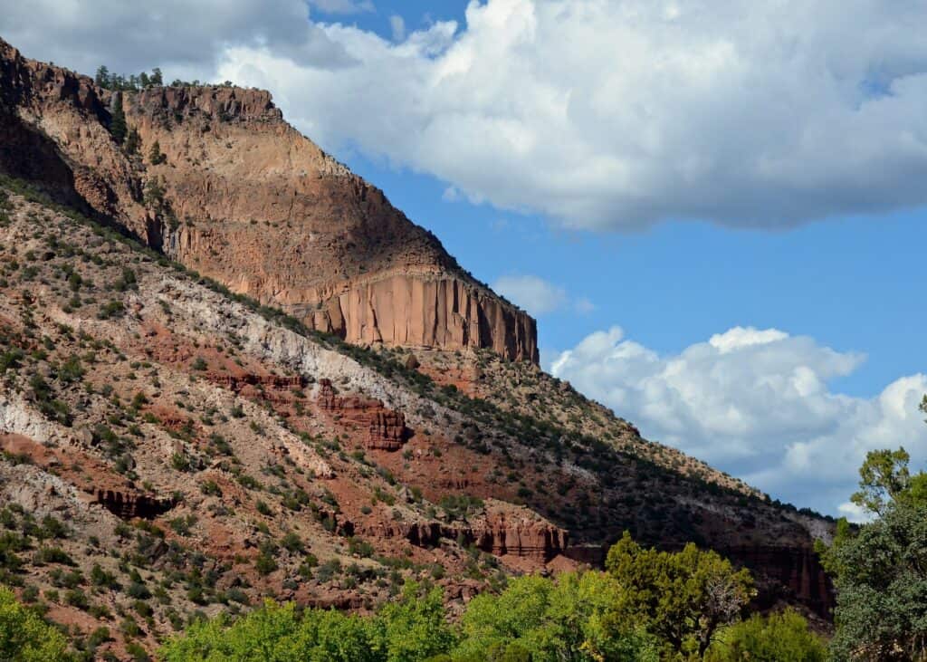 Sunlight and shadow covers a rugged landscape at Jemez National Recreation Area.