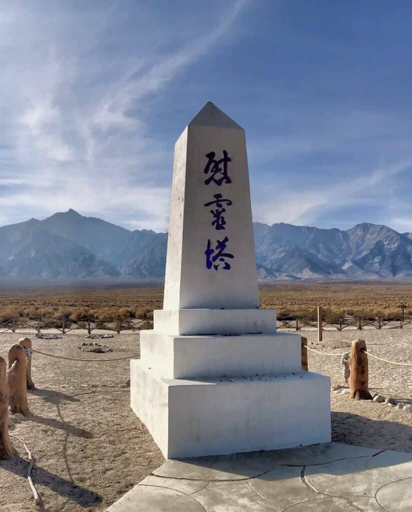 A white obelisk remembers those who died while interned at Manzanar National Historic Site.