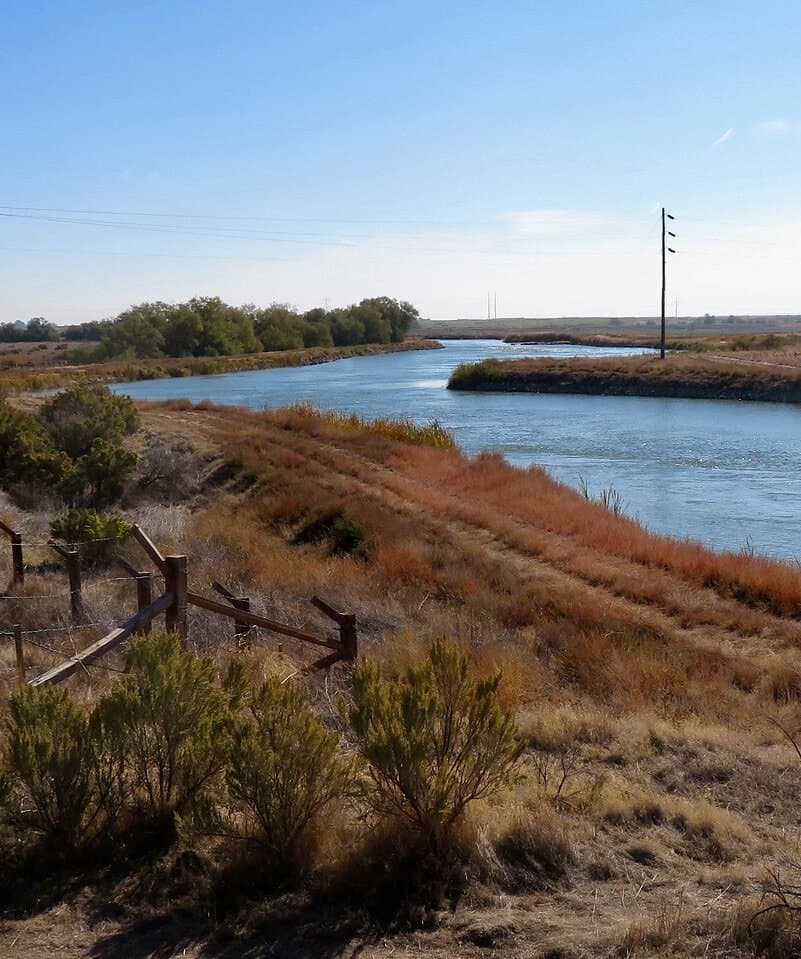 A river runs beside Minidoka National Historic Site.