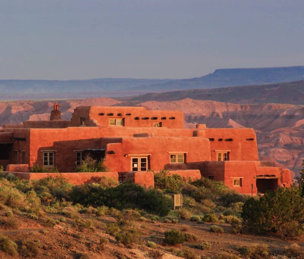 Late afternoon sunlight illuminates the beautiful Painted Desert Inn along Route 66.