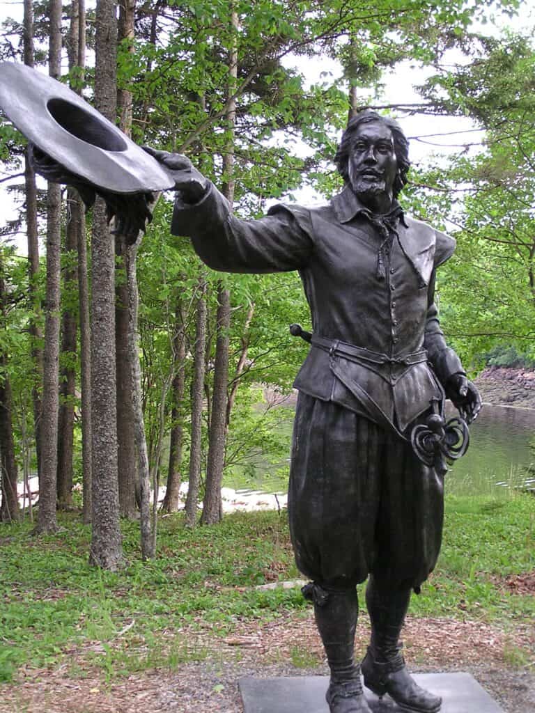 A life-size statue stands at Saint Croix Island International Historic Site.