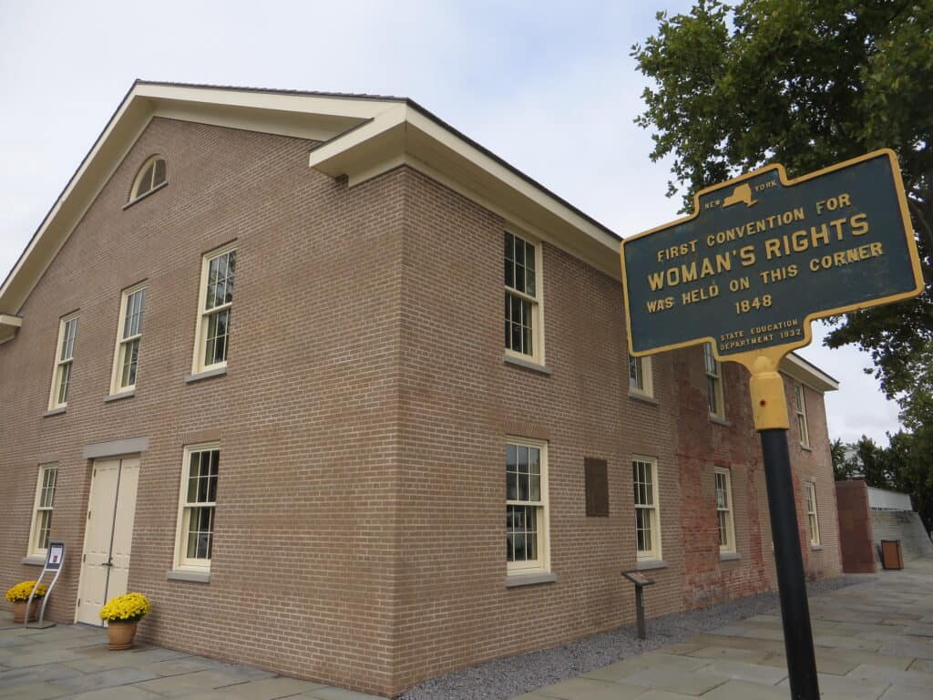 A sign designates the location of the first convention for woman's rights at Women's Right National Historical Park.