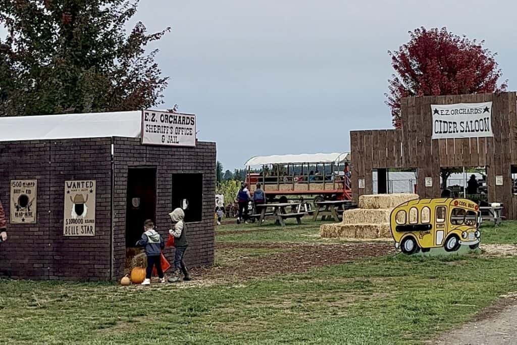 Kids play structures Apple Cider Saloon and Sheriff's Office and Jail at E Z Orchards in Salem