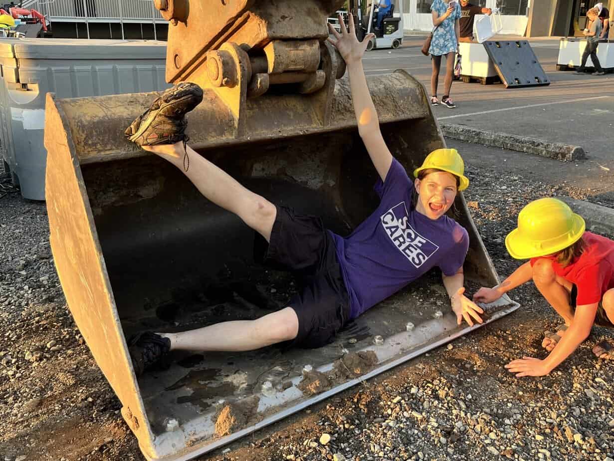 our daughter in a backhoe bucket
