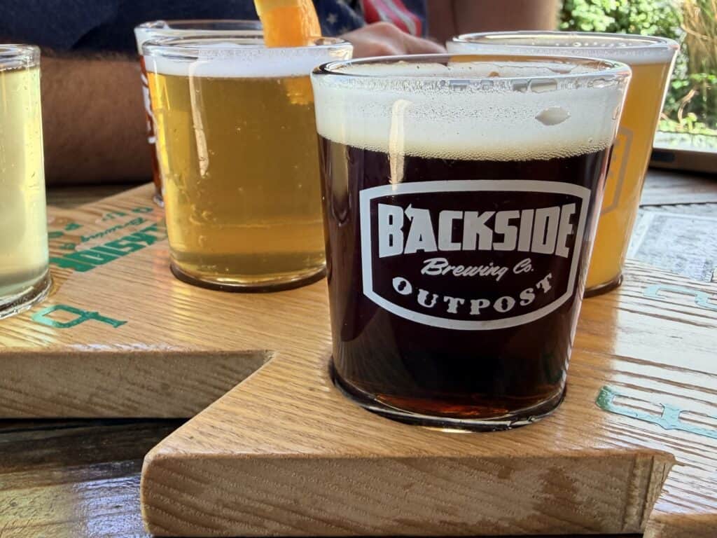 Glasses of beer flight at Backside Brewing Company Outpost.