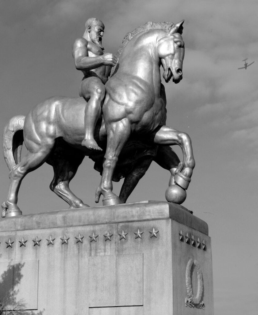 A monumental equestrian figure stands along the Memorial Bridge on the George Washington Memorial Parkway.