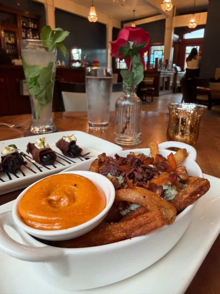 Dirty fries and bacon wrapped dates at the Noble Fox