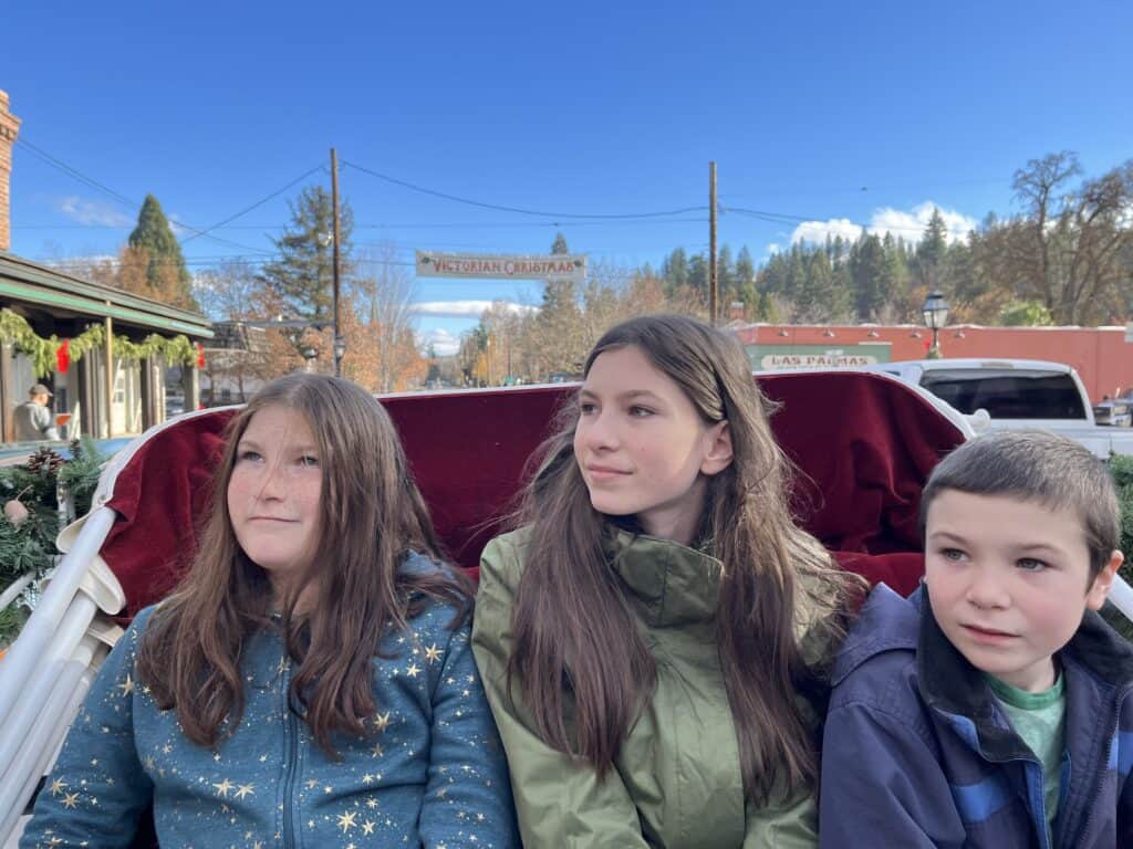 Our children enjoy a ride in a beautiful carriage at Jacksonville, Oregon.