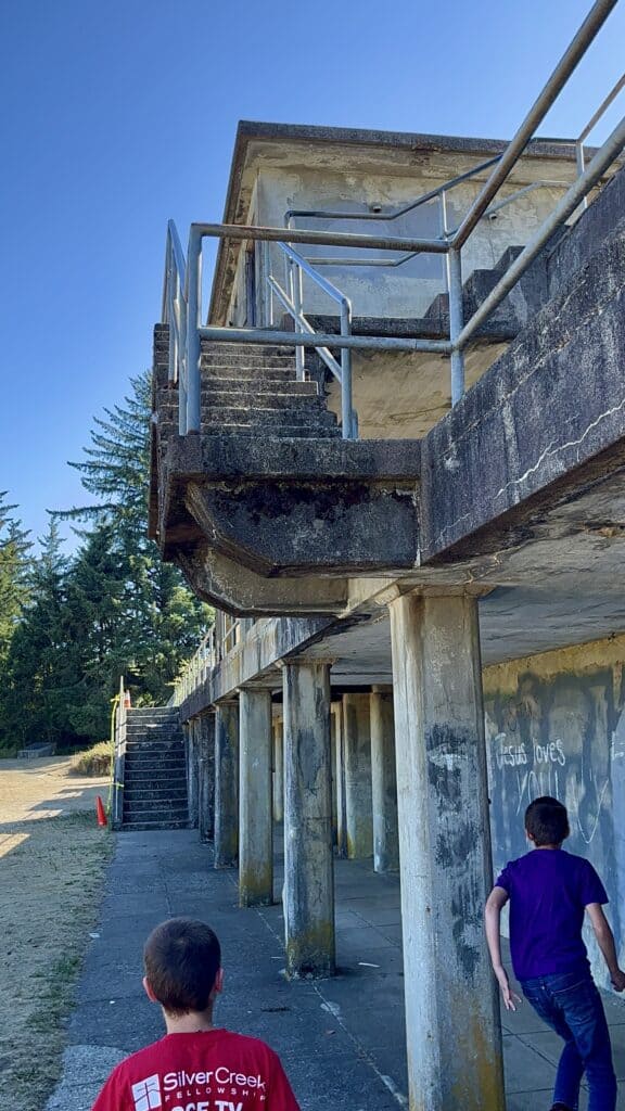 Our boys explore Battery Russel at Fort Stevens State Park.