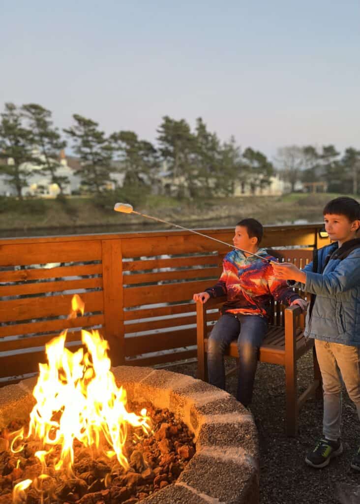 Our boys roast marshmallows at the River Inn in Seaside, Oregon.
