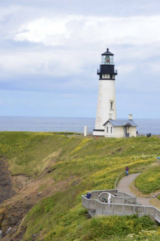 The Yaquina Head Lighthouse stands on a beautiful day in Newport, Oregon.