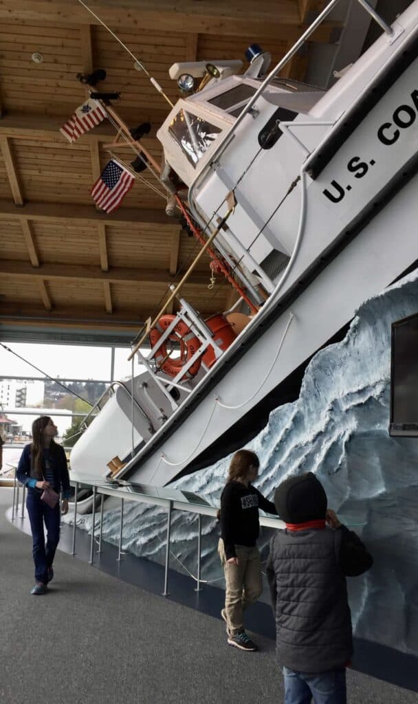 Our children admire a display of a US Coast Guard ship at the Astoria Maritime Museum.