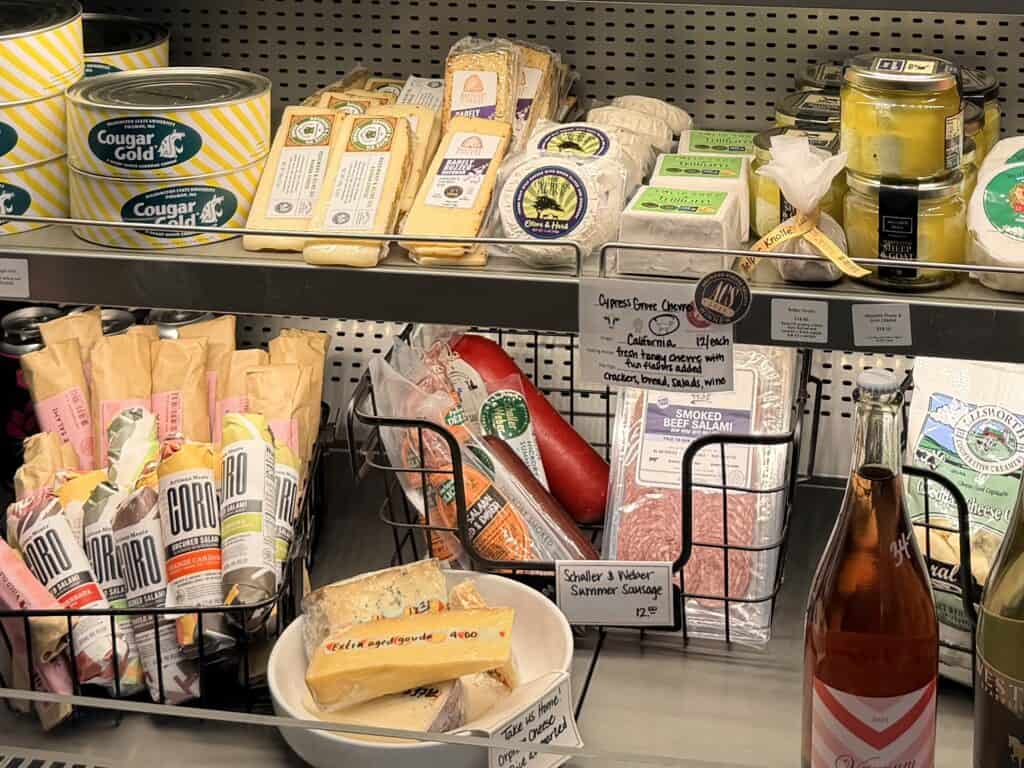 Cheese accompaniments in a refrigerator case