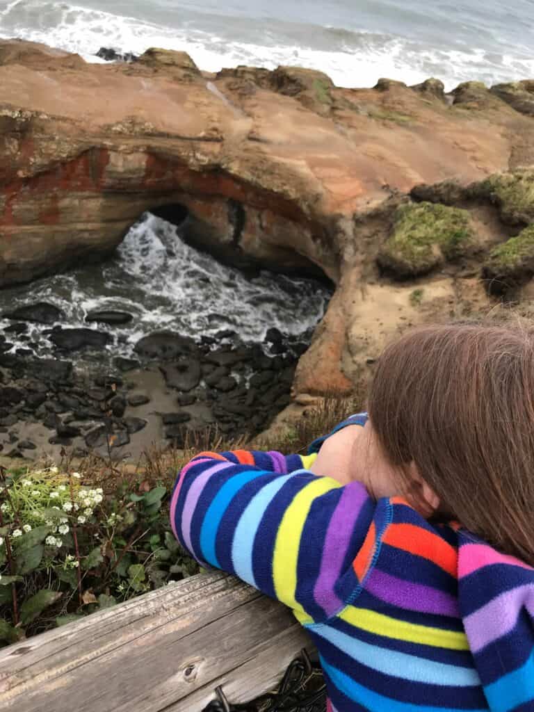 Our daughter overlooking the Devil's Punchbowl feature.