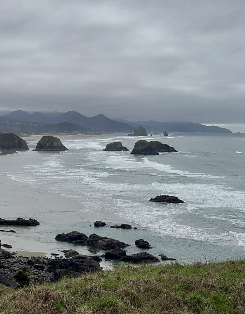 Overcast skies seem to mirror the tidal flats below at Cannon Beach.