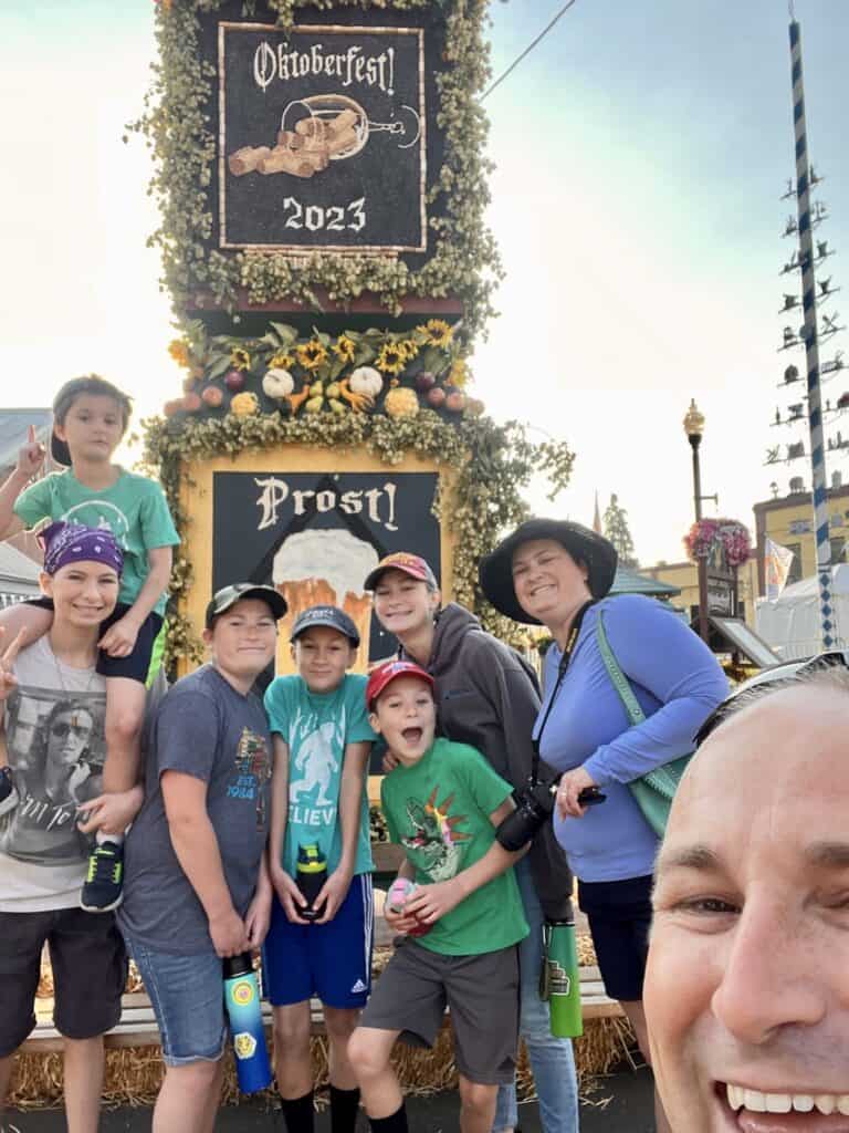 Our family in front of Mt Angel oktoberfest Harvest Monument