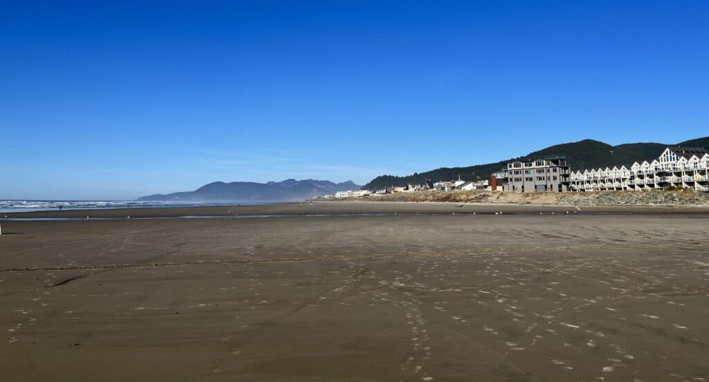 Hotels line the bluffs that fringe long, sandy Rockaway Beach.