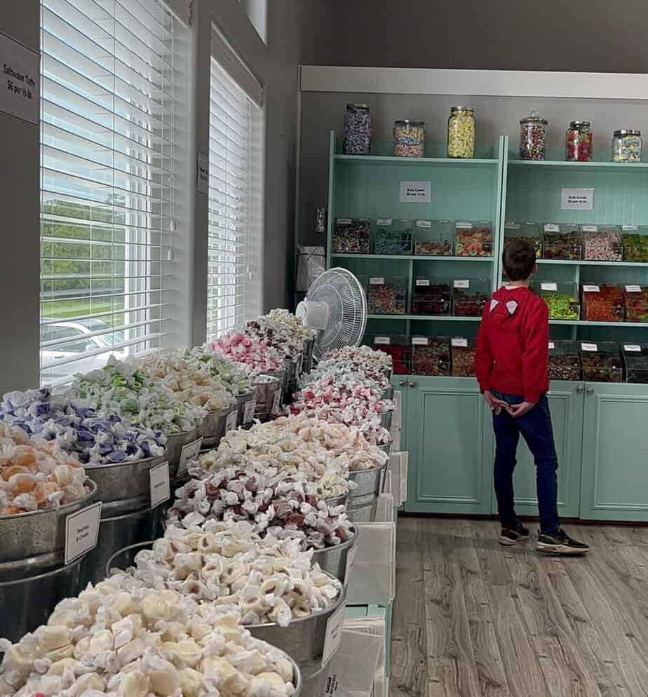 Our son surveys the goods at a candy store in Pacific City. One side of the store is rimmed with tubs that are filled with sea-salt toffee.