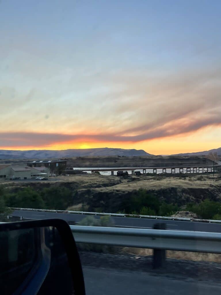 View out the window of our van looking towards the Columbia River over the highway.