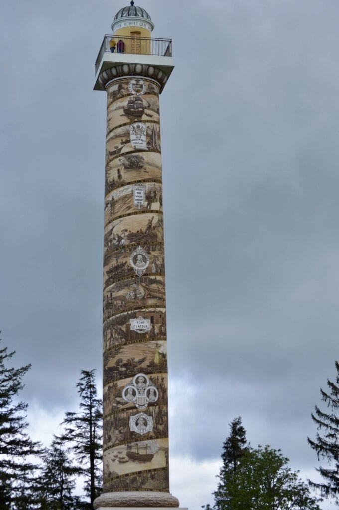 The Astoria Column stands on a gloomy Oregon day.