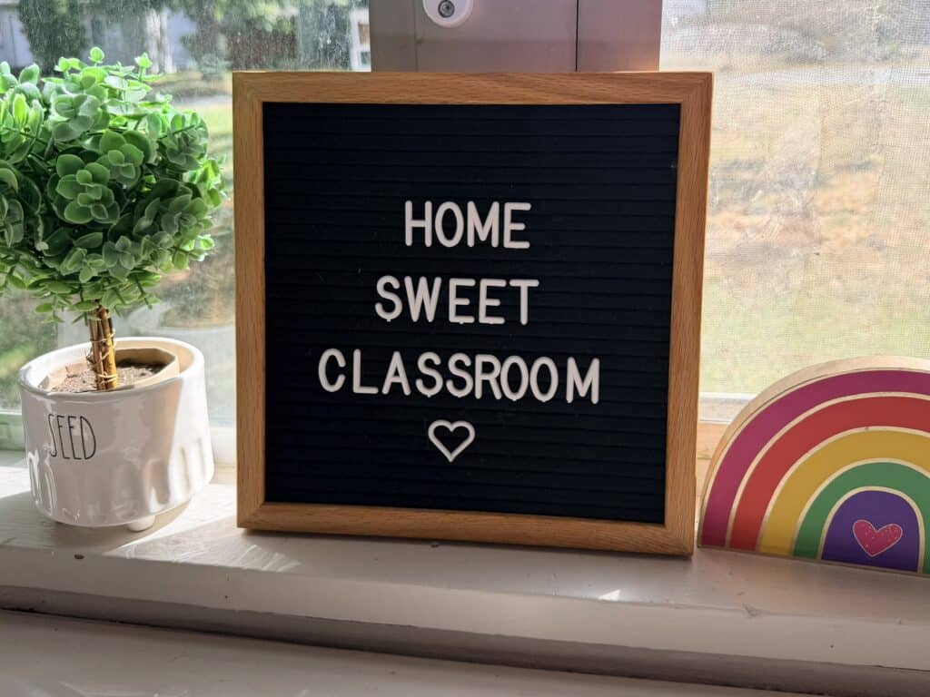 Black and white sign that reads "Home Sweet Classroom"