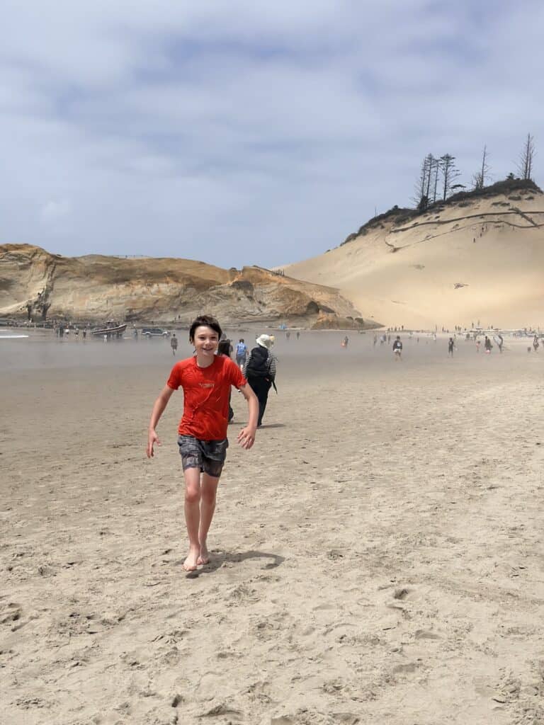 Our sun walks towards the camera with the Cape Kiwanis dune in the background.