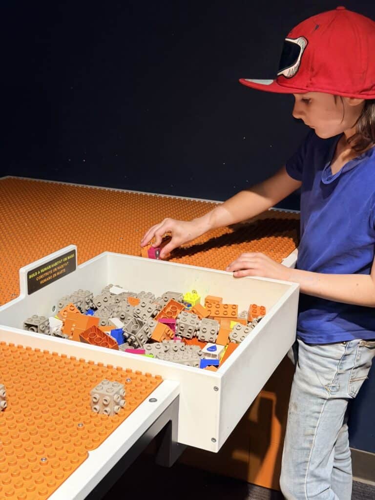 Our son uses specialty Lego pieces to design a Mars space station.